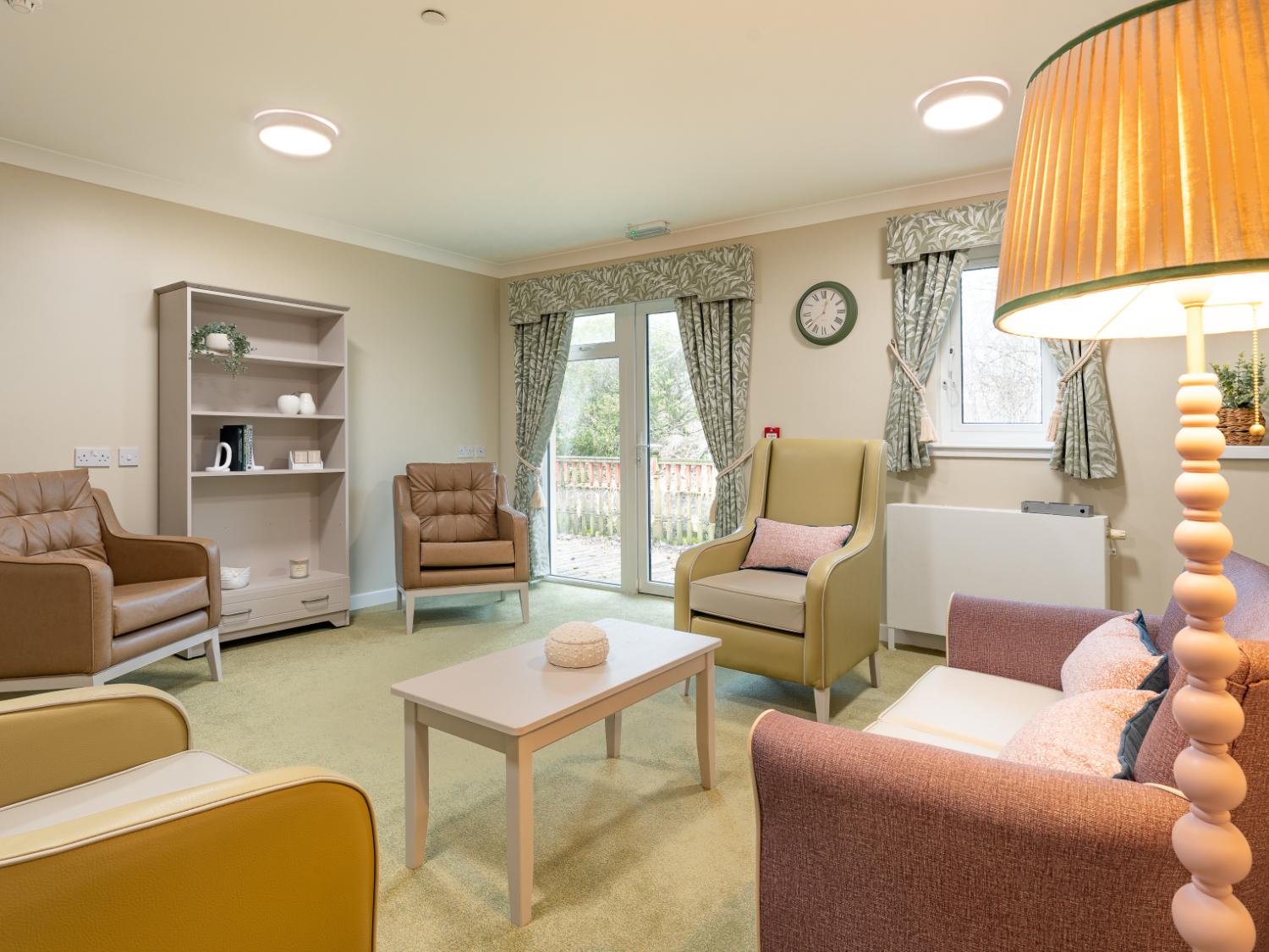 communal lounge with pastel colours in ashlea court