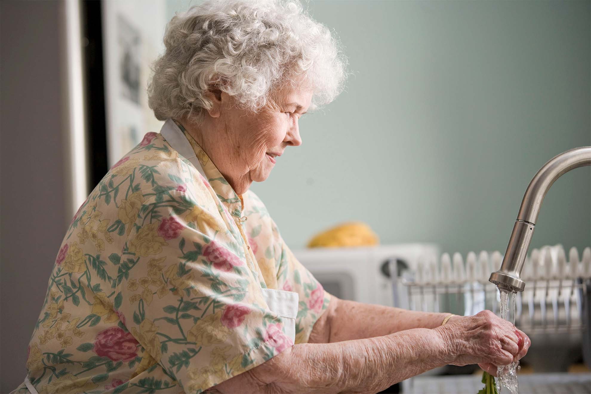 older lady washing up