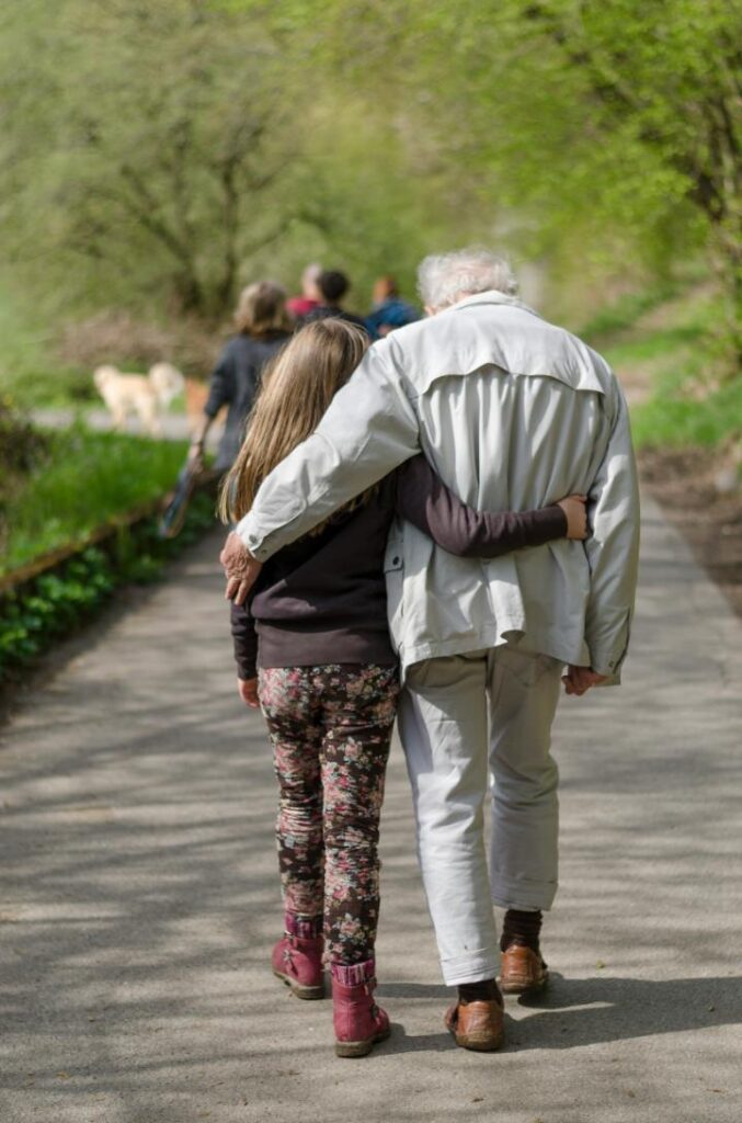 old-man-walking-with-family-member