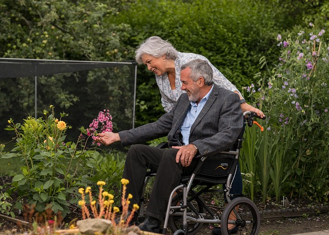 elderly couple in care home garden