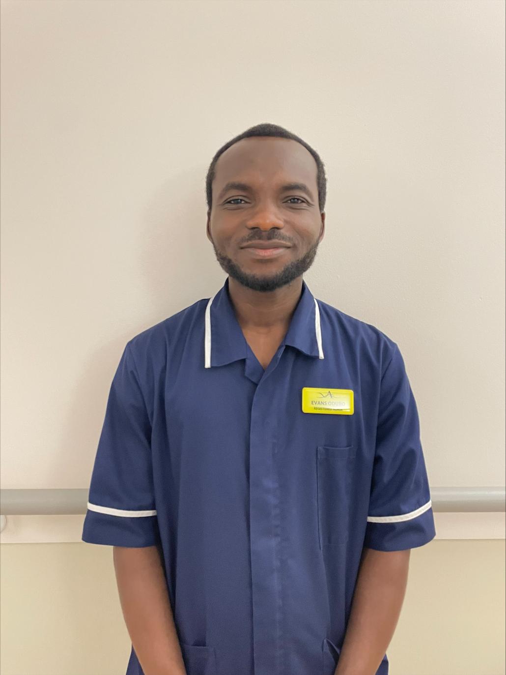 man smiling at camera for staff photo