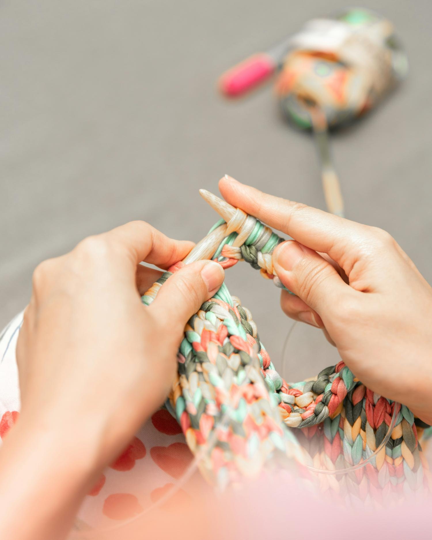 hands doing knitting