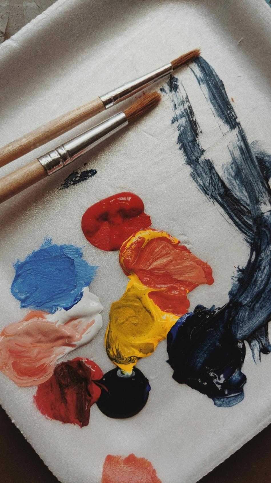 paints and brushes on a palette